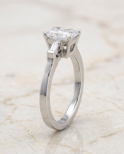 The June Three Stone Radiant Cut Engagement Ring Setting in Platinum