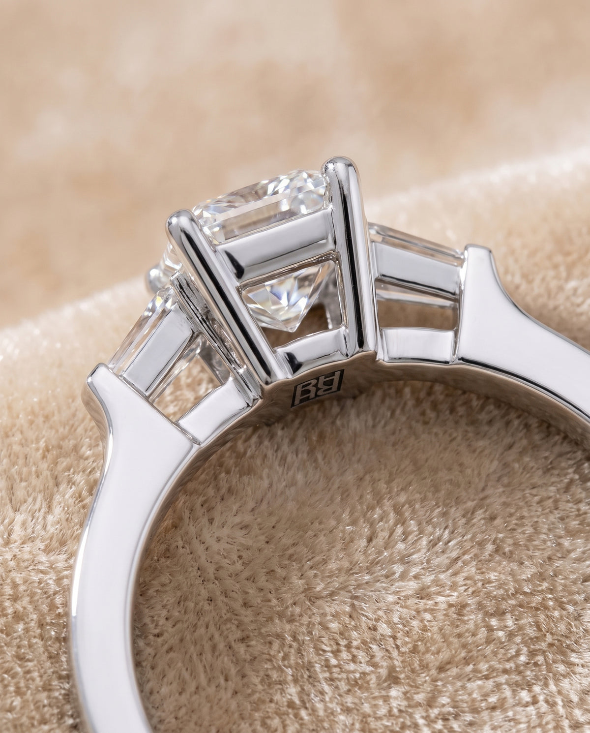 The June Three Stone Radiant Cut Engagement Ring Setting in Platinum
