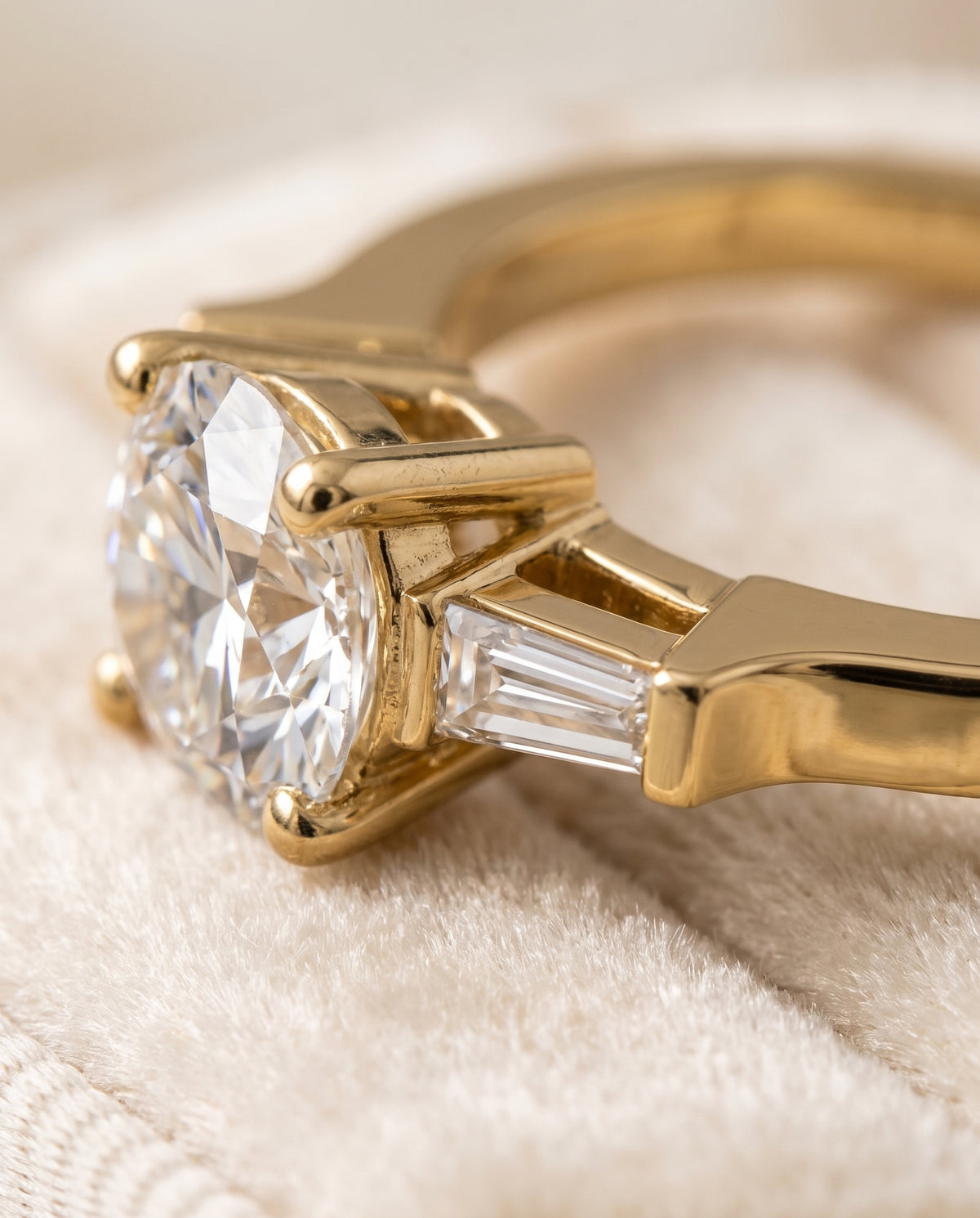 The June Three Stone Round Engagement Ring Setting in 18K Yellow Gold