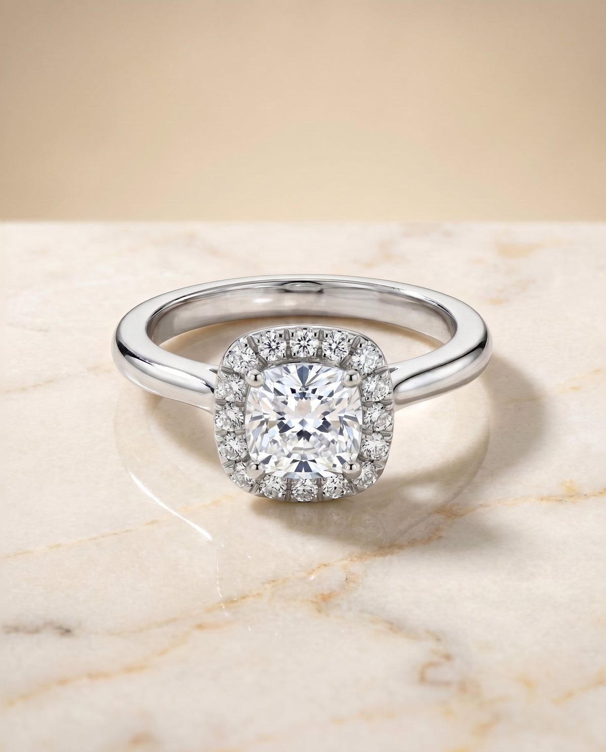 Kate Select Halo Cushion Cut Lab Diamond Engagement Ring in Platinum, shown on hand, angled | RockHer