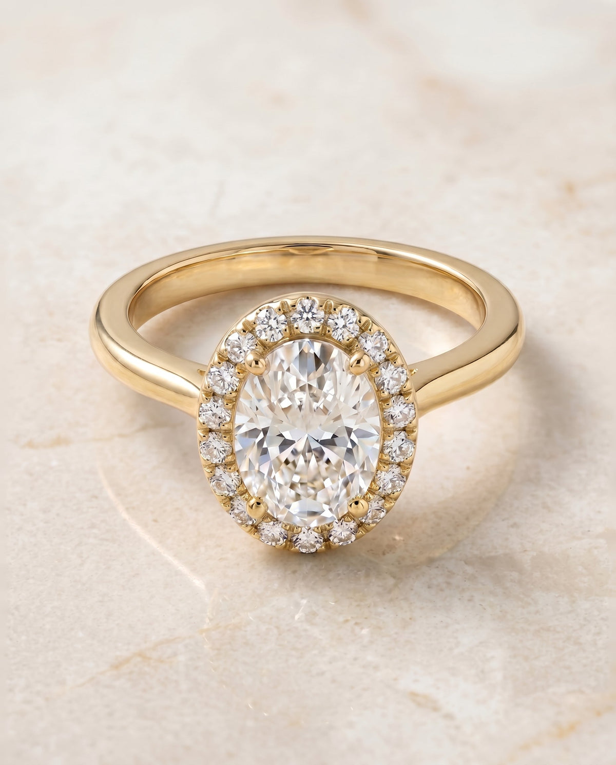 Kate Select Classic French Pavé Halo Oval Lab Diamond Engagement Ring in 18K Yellow Gold, shown on hand, angled | RockHer