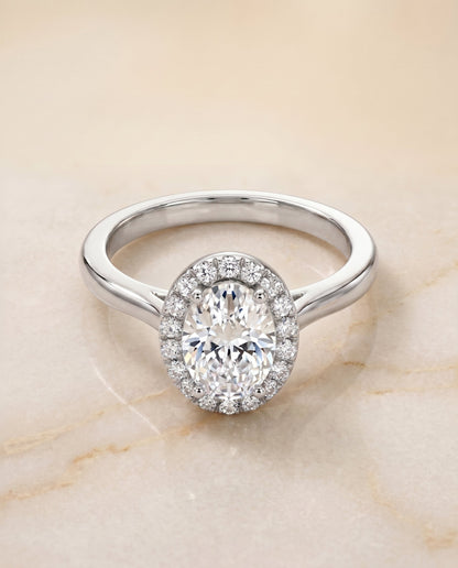 Kate Select Halo Oval Lab Diamond Engagement Ring in Platinum, shown on hand, angled | RockHer