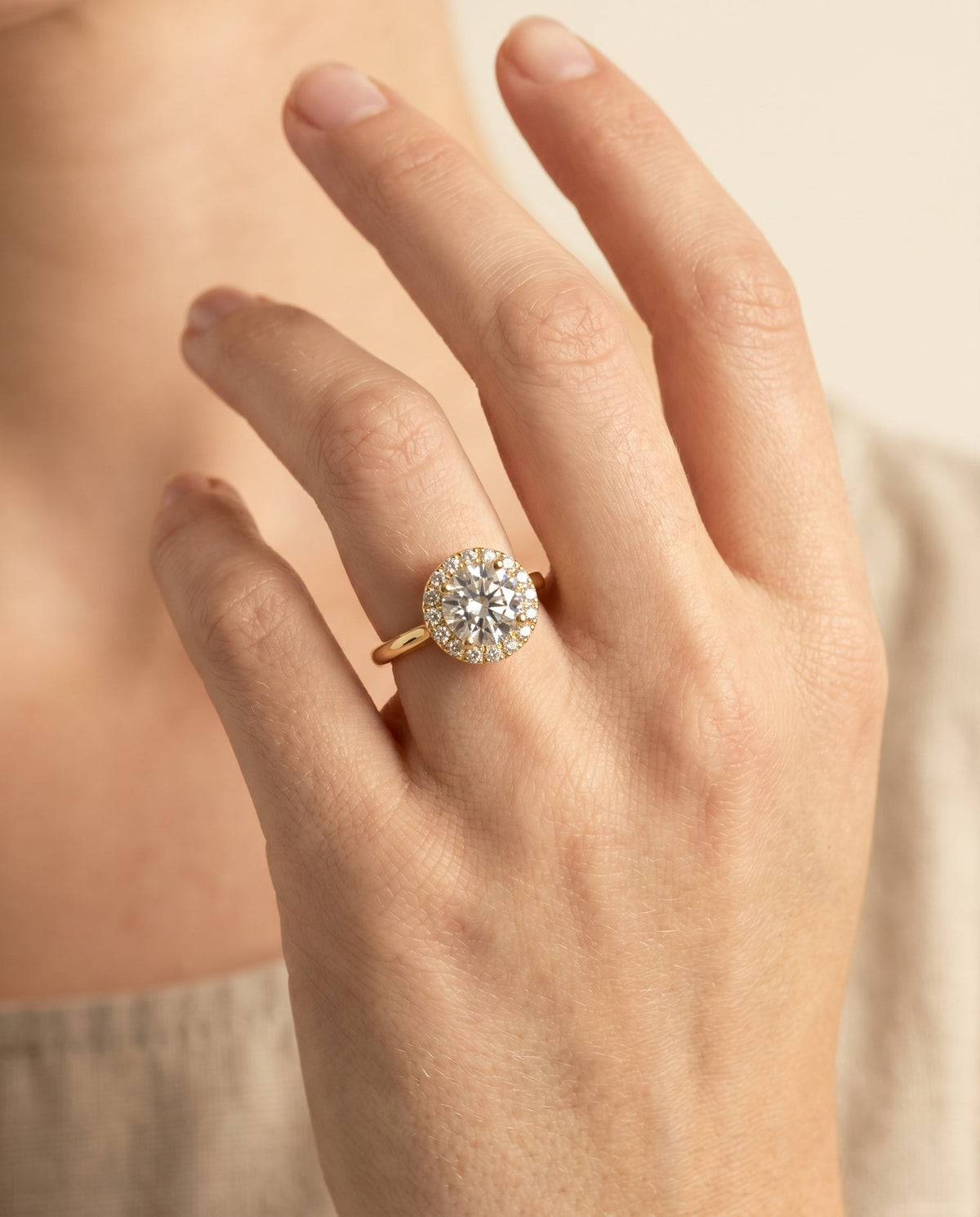 Kate Select Halo Round Lab Diamond Engagement Ring in 18K Yellow Gold, shown on hand | RockHer
