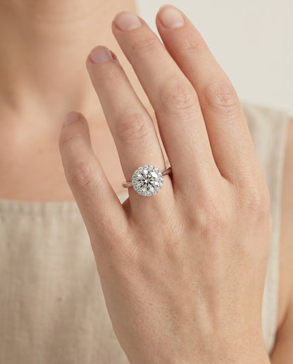 Kate Select Halo Round Lab Diamond Engagement Ring in Platinum, shown on hand | RockHer