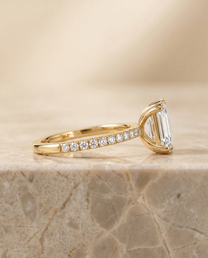 The Kelly Double Claw Prong French Pavé Emerald Cut Engagement Ring Setting in 18K Yellow Gold
