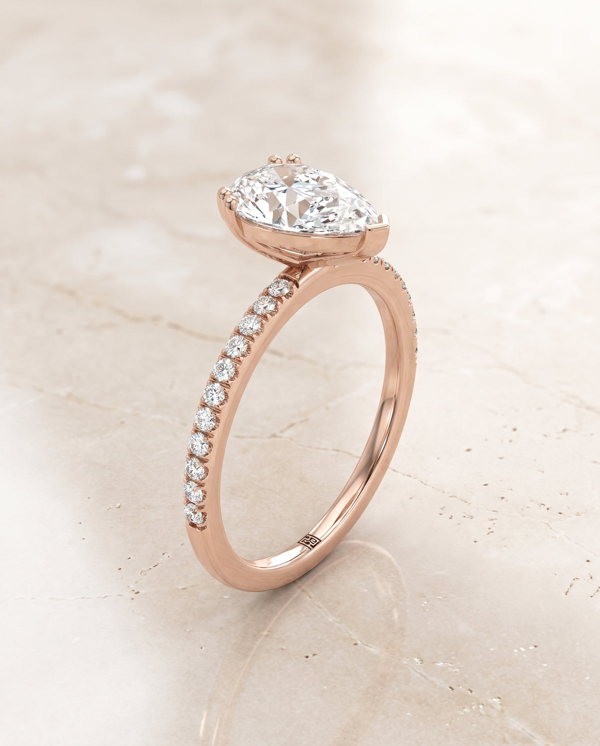 Pear engagement ring setting in 14K Rose Gold, Kelly Double Claw Prong French Pavé Pear, alternate view | RockHer