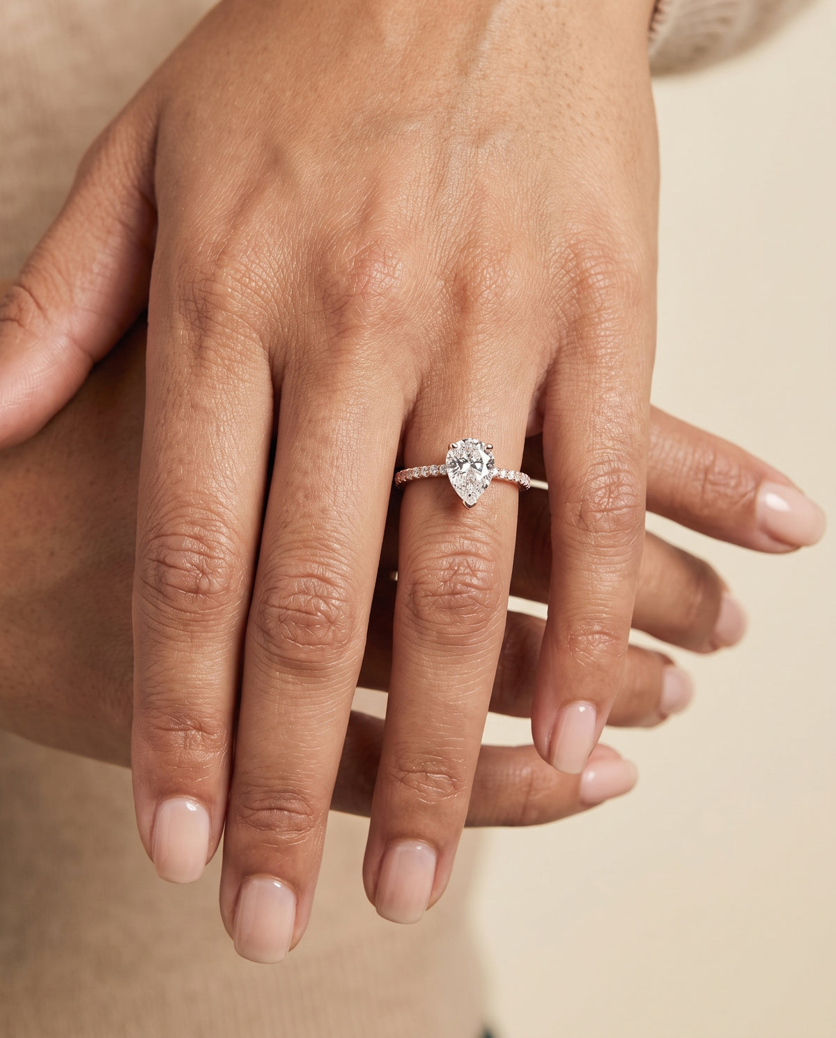 Pear engagement ring setting in 14K Rose Gold, Kelly Double Claw Prong French Pavé Pear, alternate view | RockHer