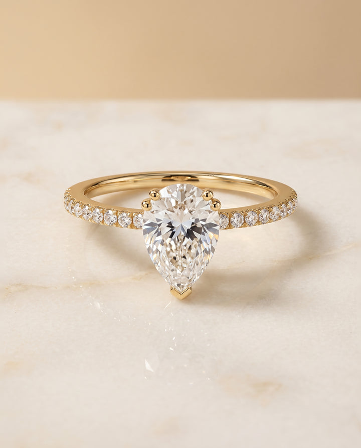 The Kelly Double Claw Prong French Pavé Pear Engagement Ring Setting in 18K Yellow Gold