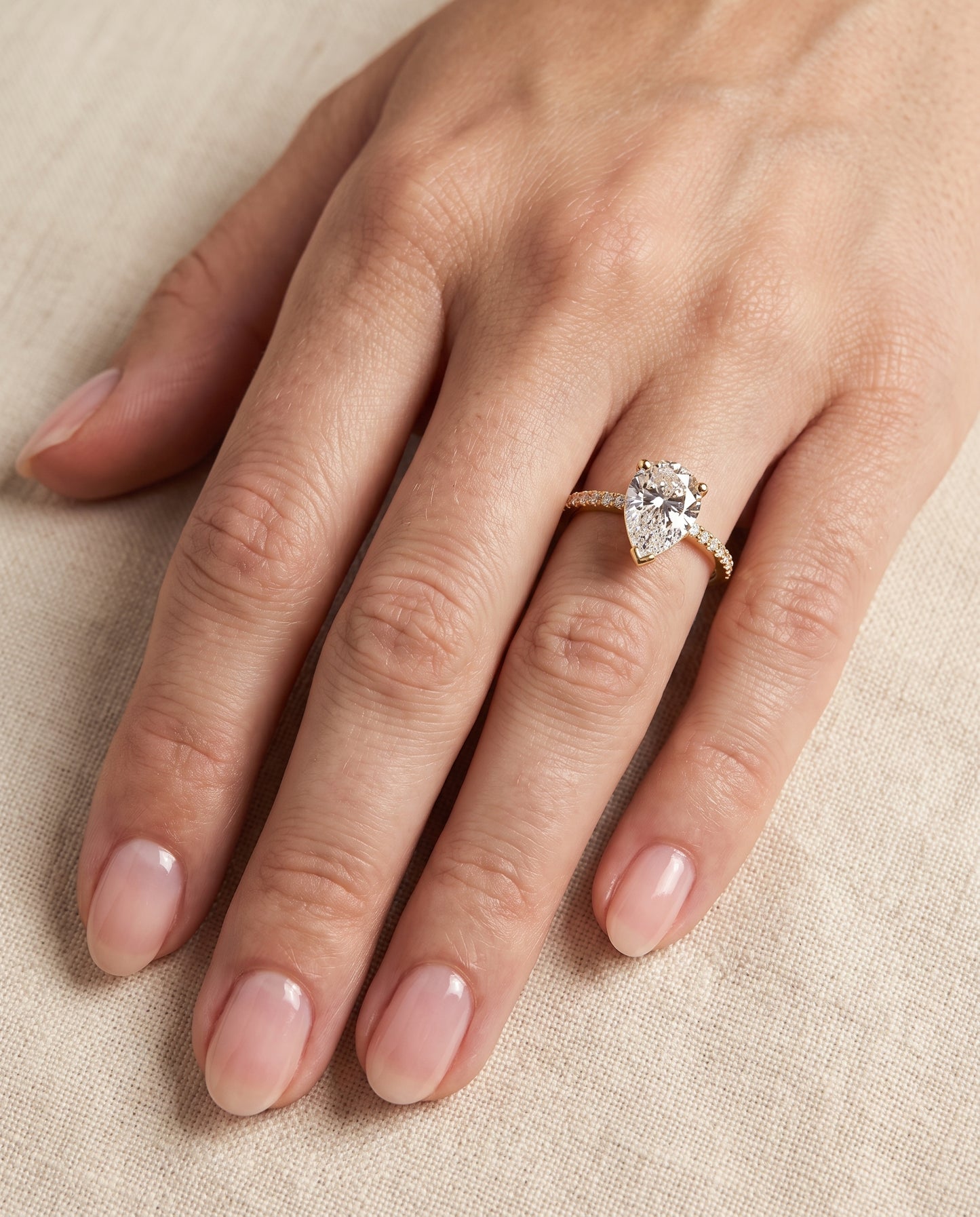 The Kelly Double Claw Prong French Pavé Pear Engagement Ring Setting in 18K Yellow Gold