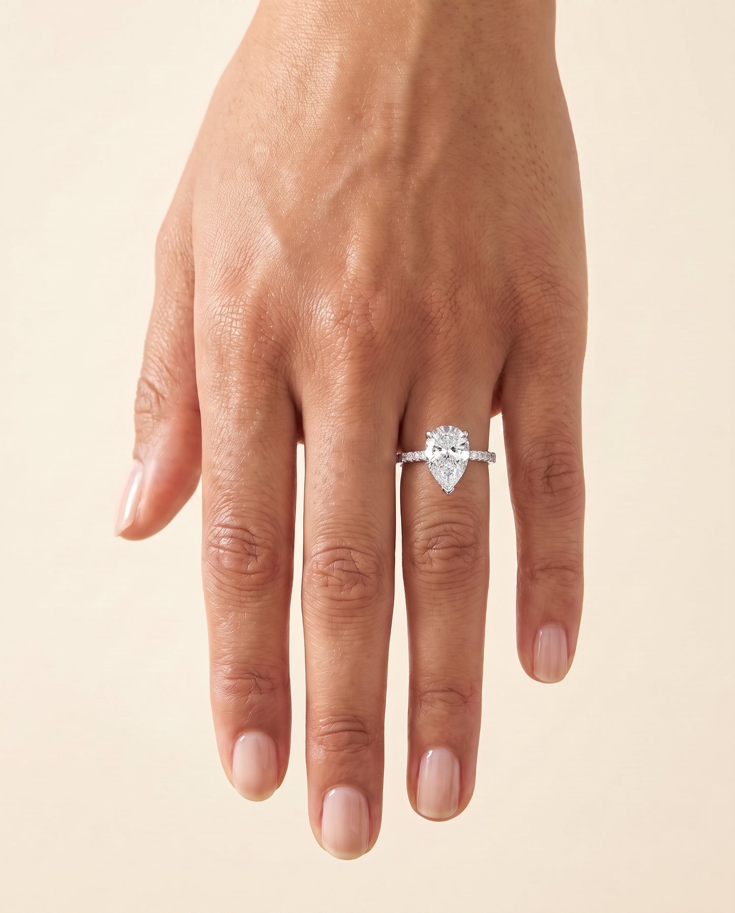 The Kelly Double Claw Prong French Pavé Pear Engagement Ring Setting in Platinum