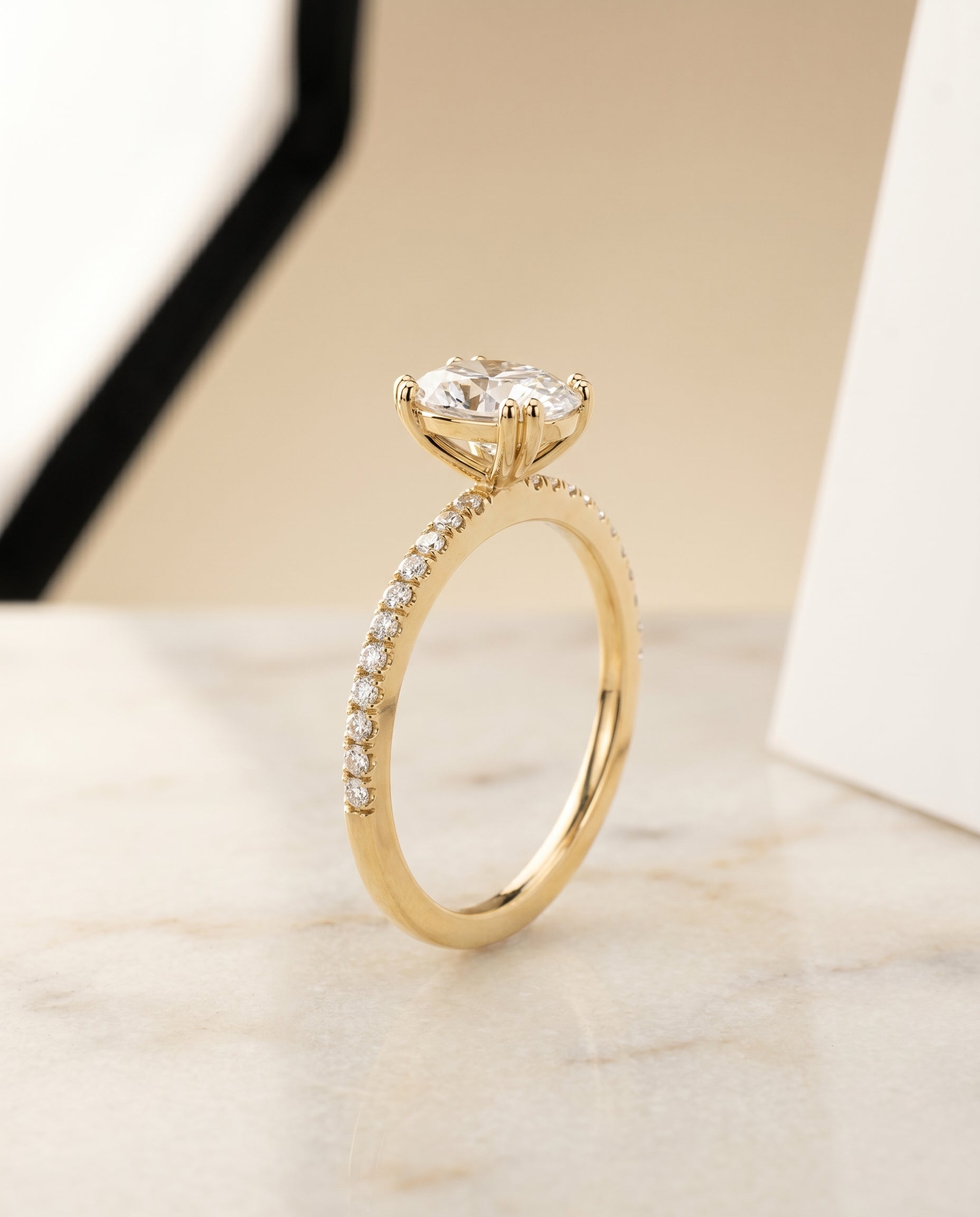 Double Claw Prong French Pavé styling on The Kelly oval engagement ring setting | RockHer