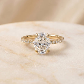 The Kelly Double Claw Prong French Pavé Oval Engagement Ring Setting in 18K Yellow Gold