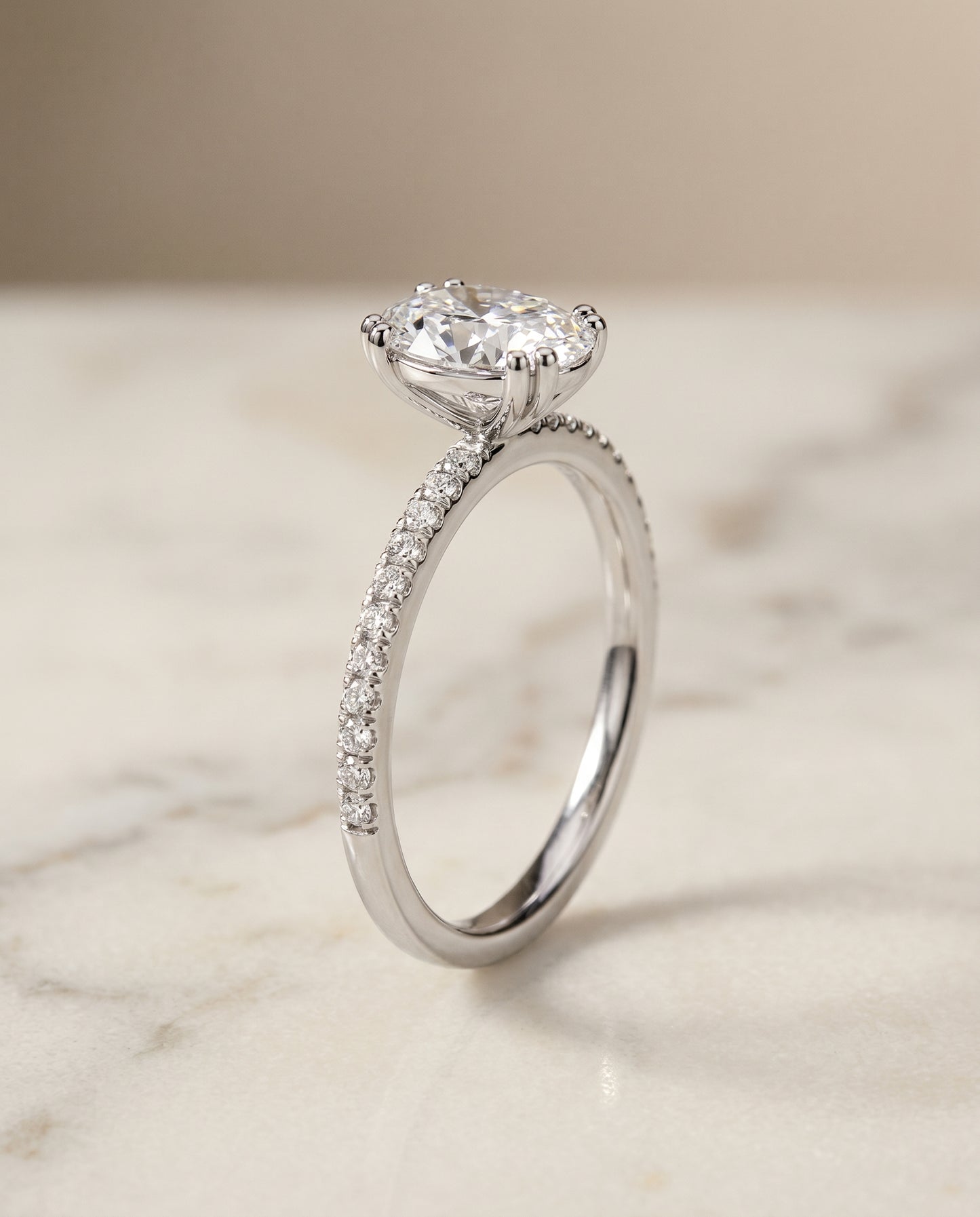 The Kelly Pavé Engagement Ring Setting for Oval Diamonds in Platinum