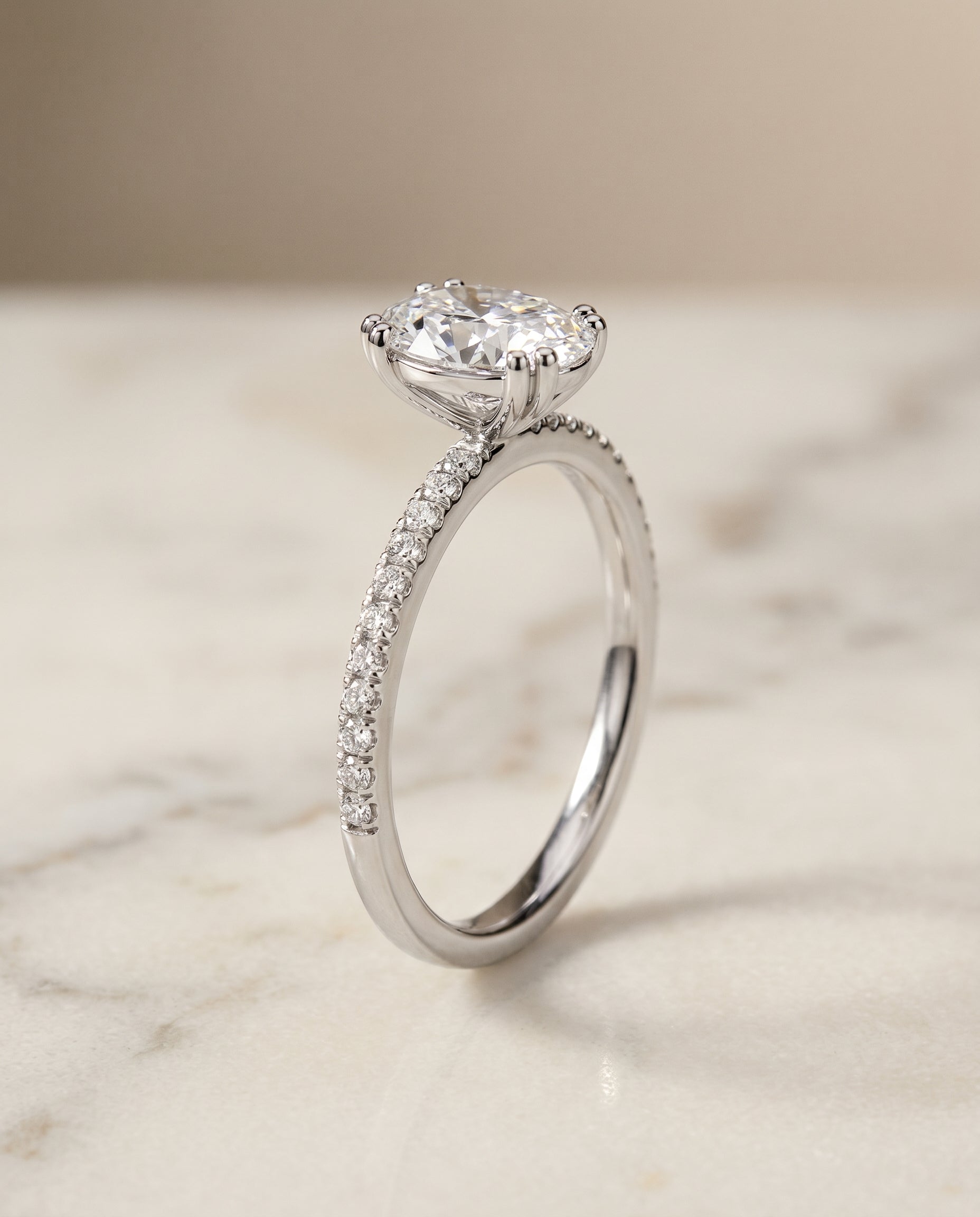 Double Claw Prong French Pavé styling on The Kelly oval engagement ring setting | RockHer