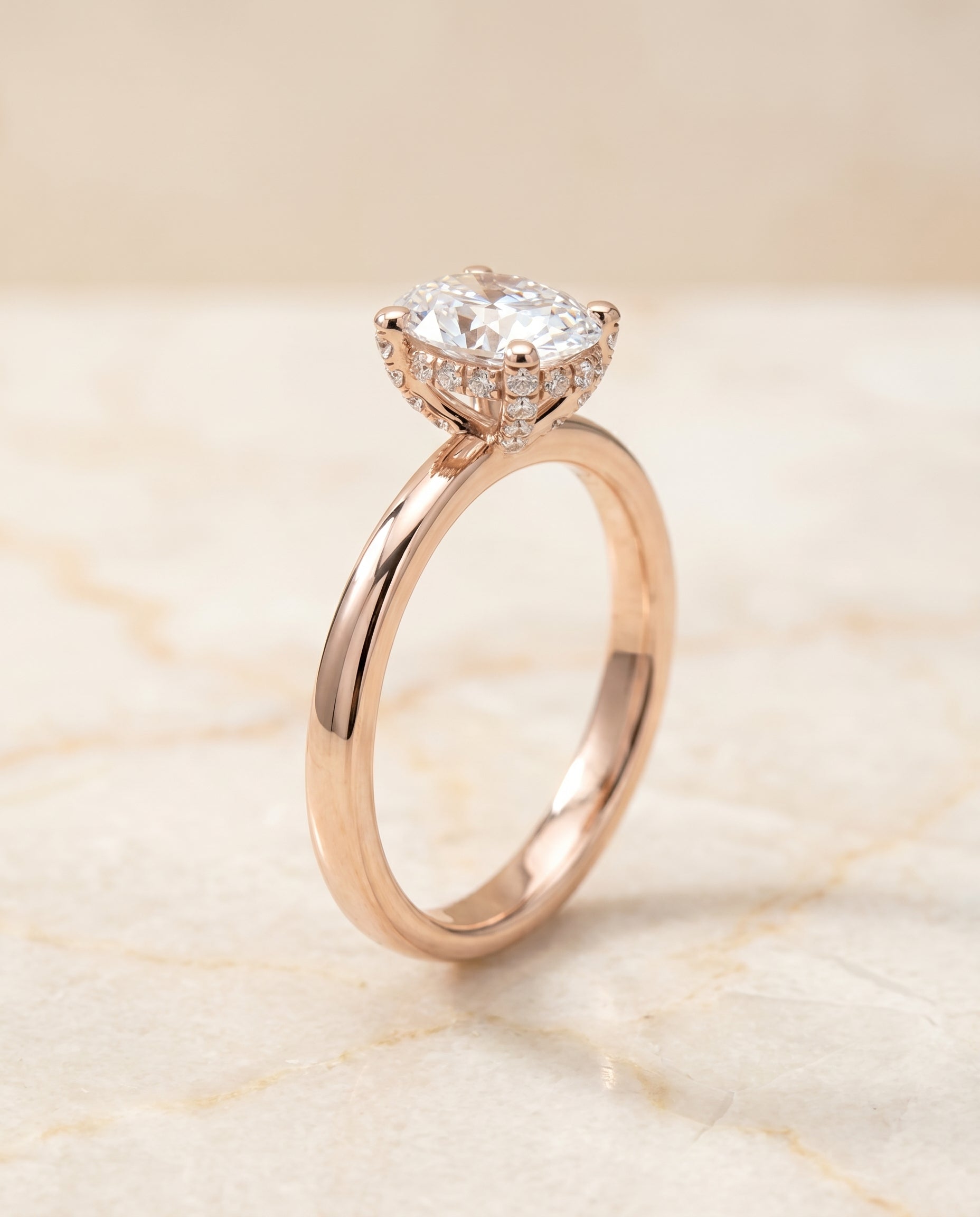 Secret Halo Adorned Prong Solitaire styling on The Lana oval engagement ring setting | RockHer
