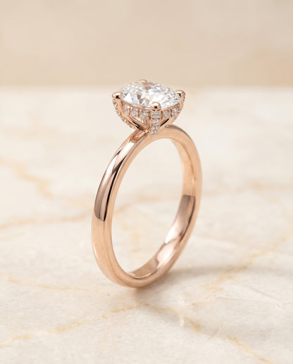 The Lana Secret Halo Adorned Prong Solitaire Oval Engagement Ring Setting in 14K Rose Gold