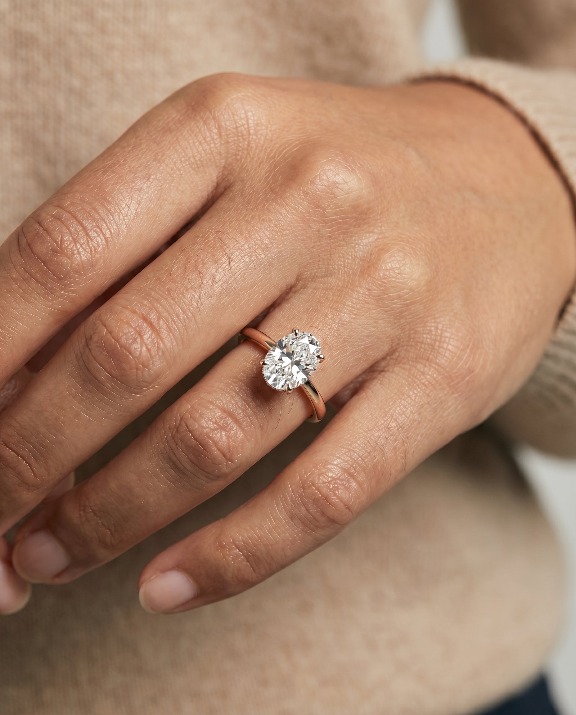 The Lana engagement ring setting in 14K Rose Gold, secret halo adorned prong solitaire design | RockHer
