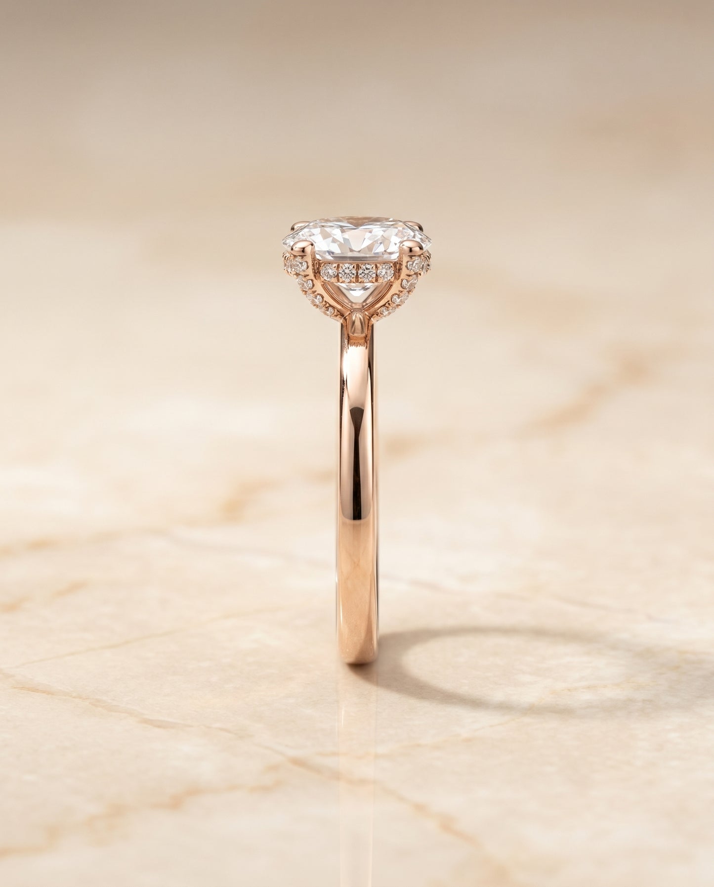 The Lana Secret Halo Adorned Prong Solitaire Oval Engagement Ring Setting in 14K Rose Gold