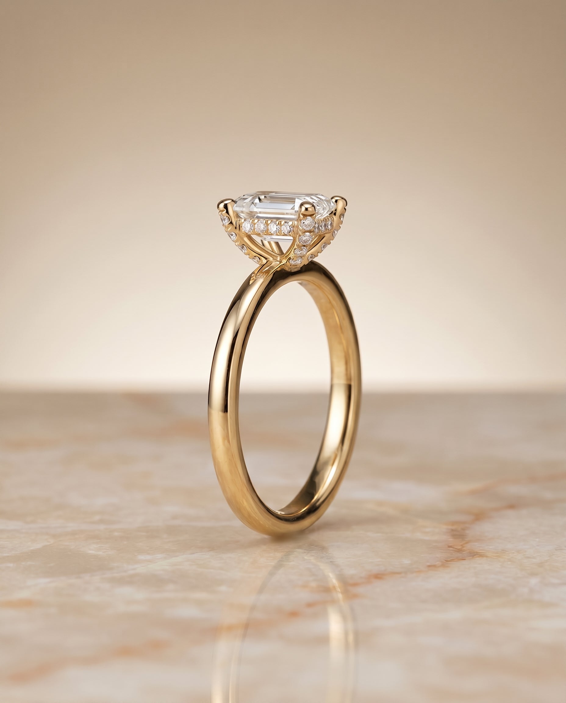 Secret Halo Adorned Prong Solitaire Cut styling on The Lana emerald engagement ring setting | RockHer