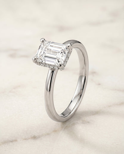 Lana Select Hidden Halo Emerald Cut Lab Diamond Engagement Ring in Platinum, front view | RockHer