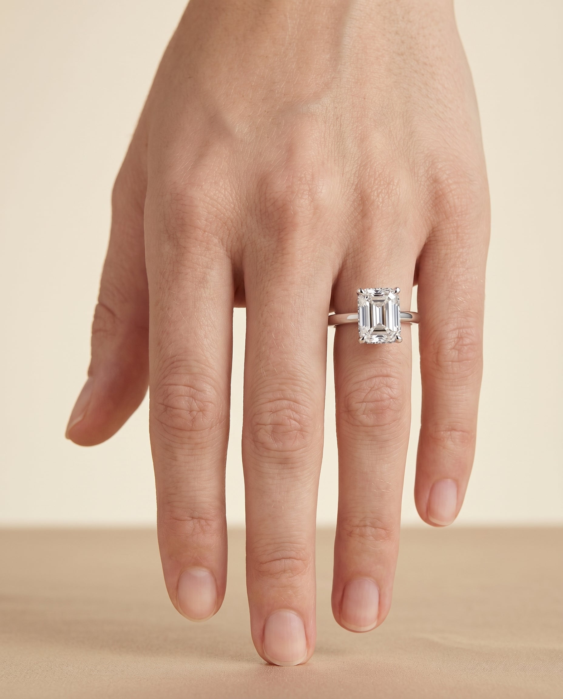 The Lana engagement ring setting in Platinum, secret halo adorned prong solitaire cut design | RockHer
