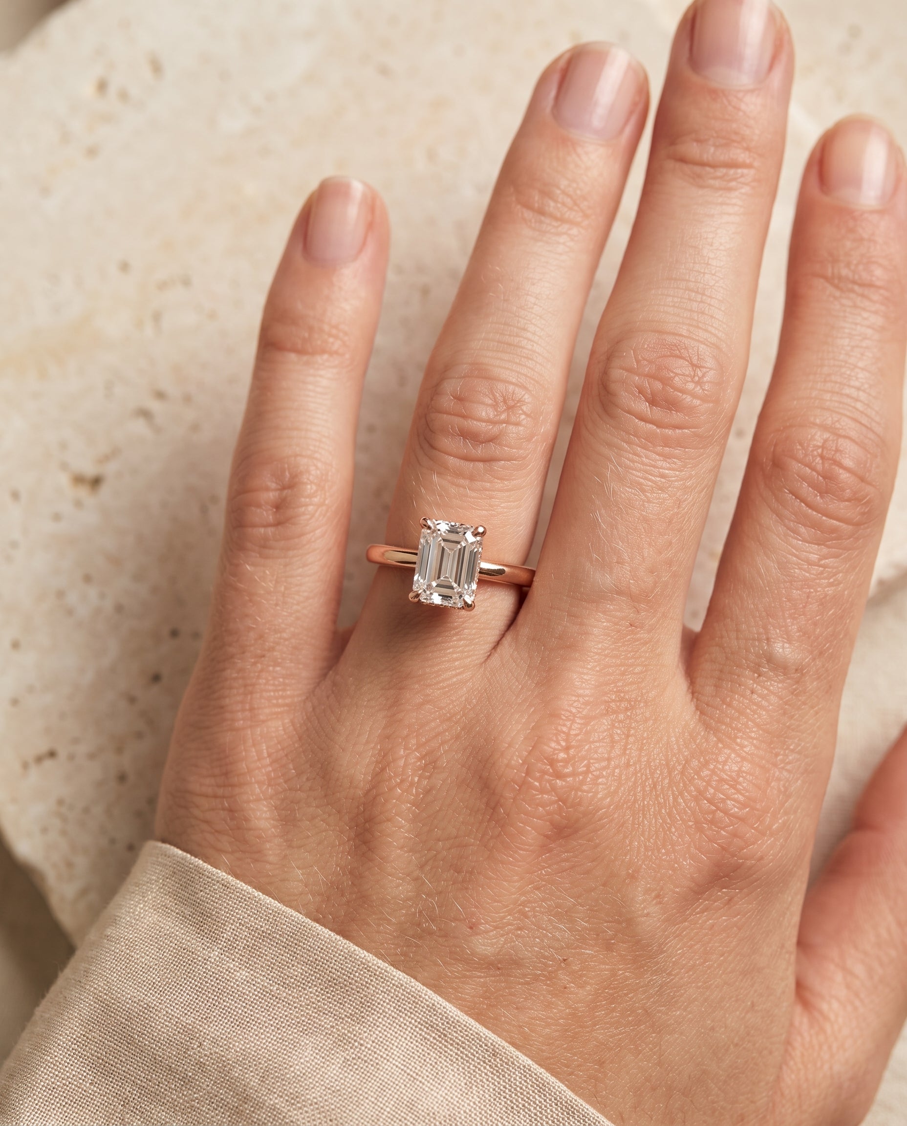 The Lana engagement ring setting in 14K Rose Gold, secret halo adorned prong solitaire cut design | RockHer