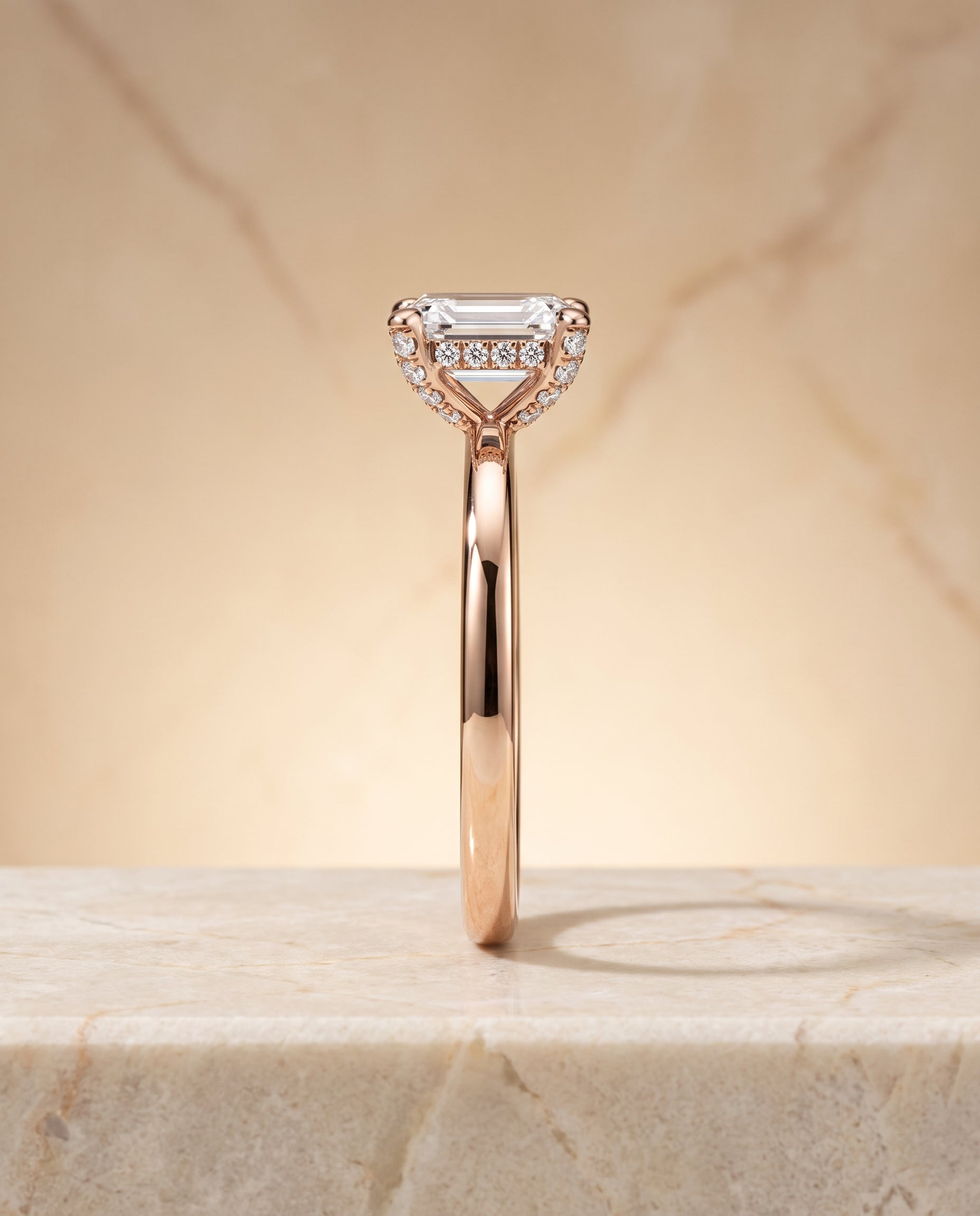 Secret Halo Adorned Prong Solitaire Cut styling on The Lana emerald engagement ring setting | RockHer