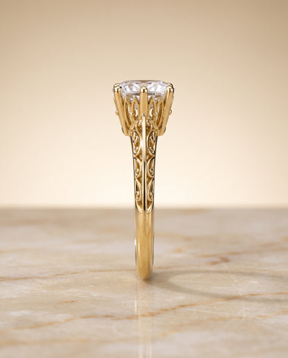 The Layla Vintage Scroll Cutout Solitaire Oval Engagement Ring Setting in 18K Yellow Gold
