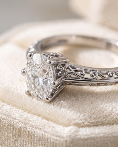 The Layla Vintage Scroll Cutout Solitaire Oval Engagement Ring Setting in Platinum
