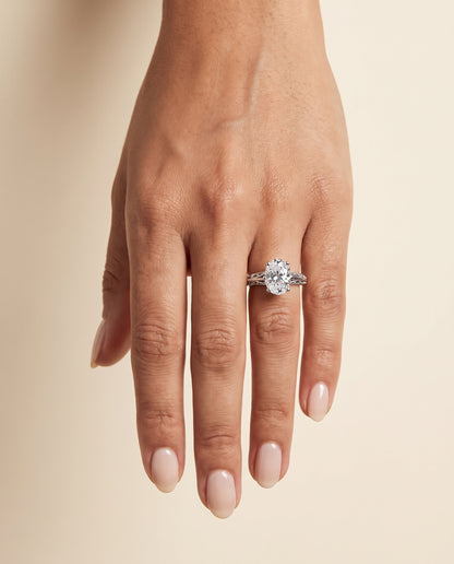 The Layla Vintage Scroll Cutout Solitaire Oval Engagement Ring Setting in Platinum