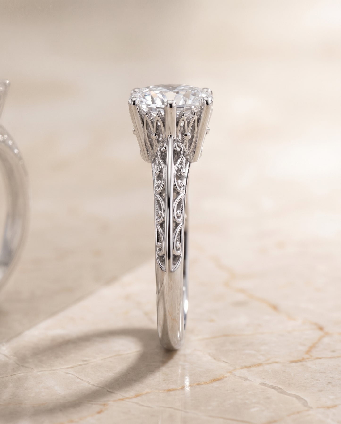 The Layla Vintage Scroll Cutout Solitaire Oval Engagement Ring Setting in Platinum
