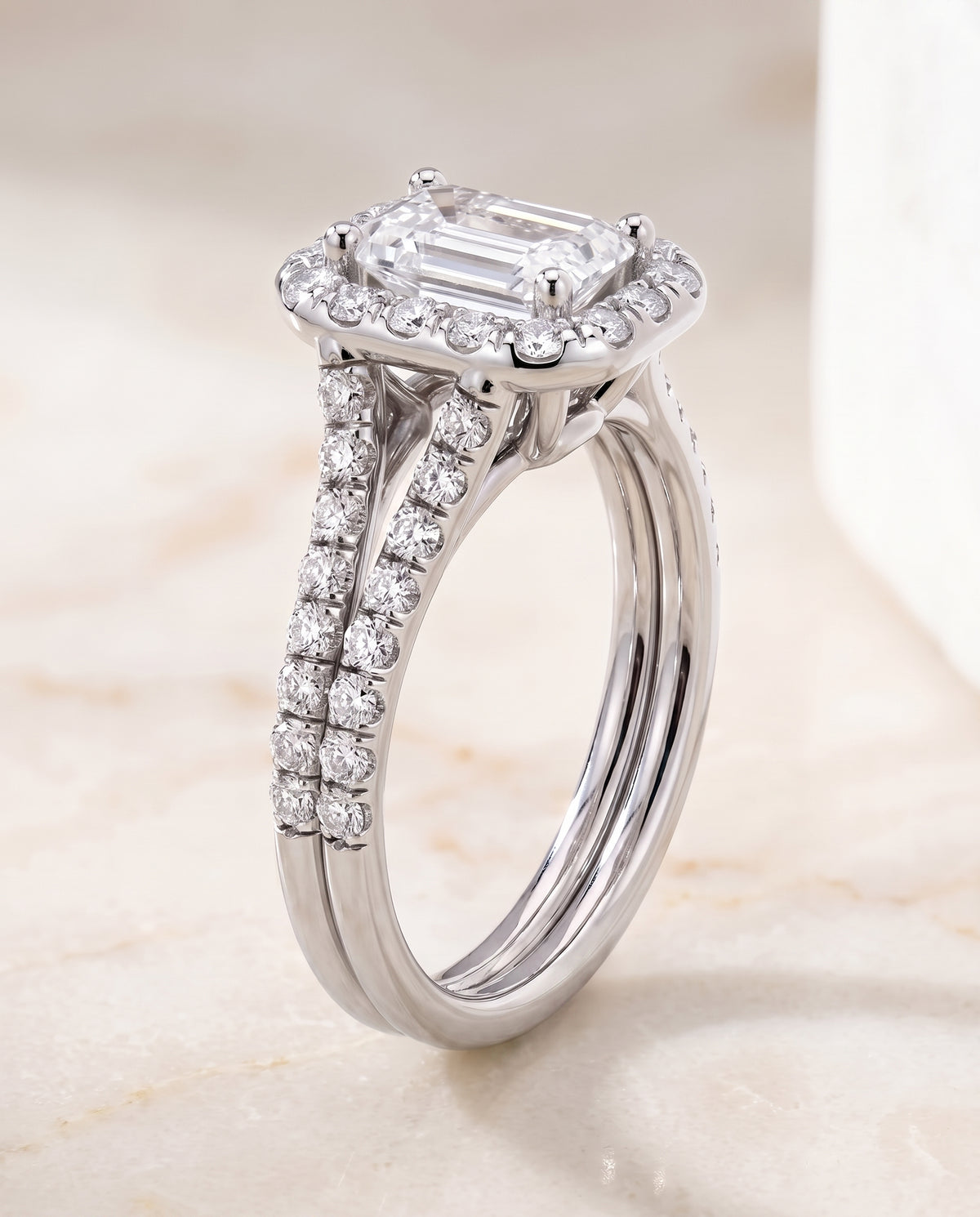 The Lira French Pavé Split Shank Halo Emerald Cut Engagement Ring Setting in Platinum