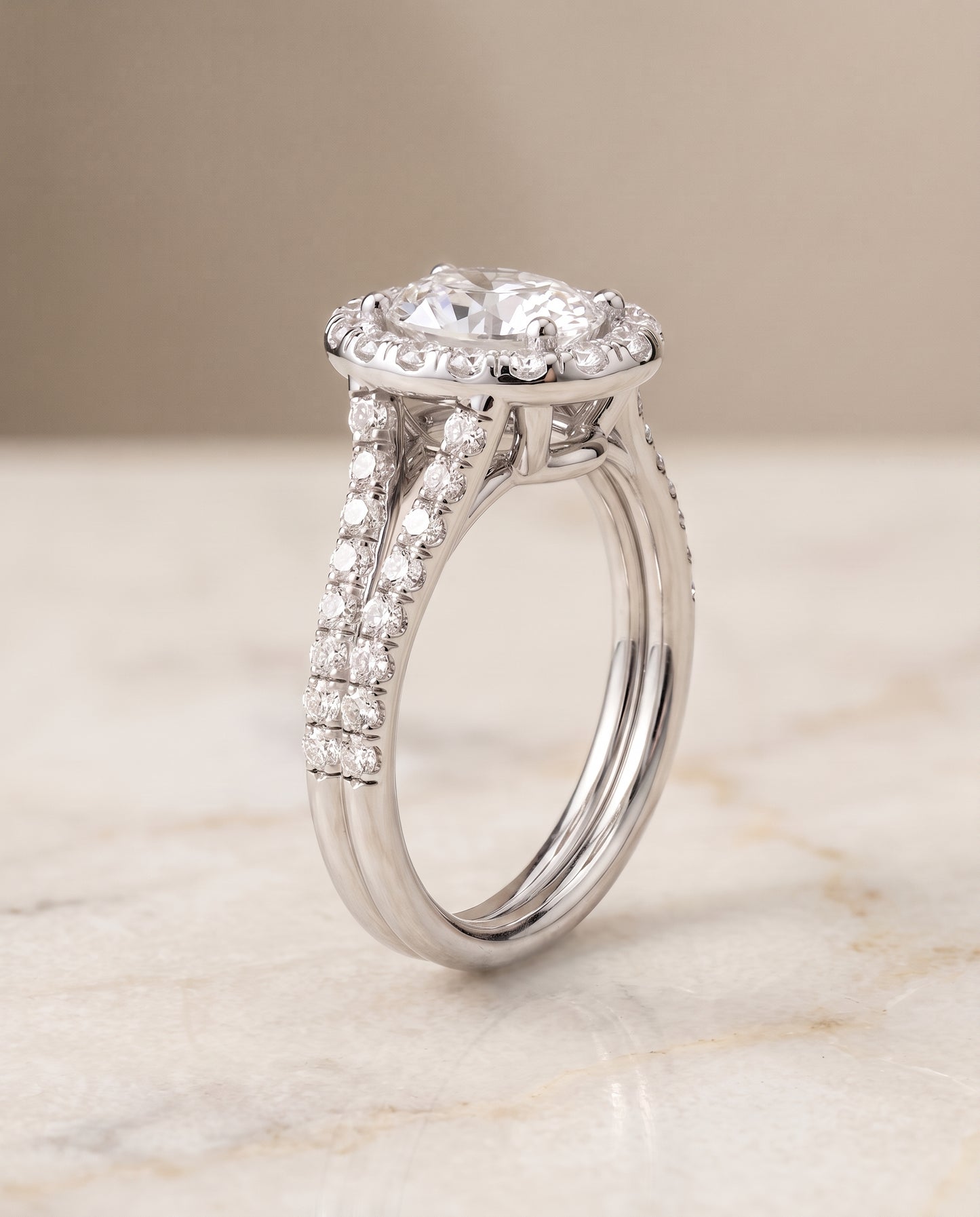The Lira French Pavé Split Shank Halo Oval Engagement Ring Setting in Platinum