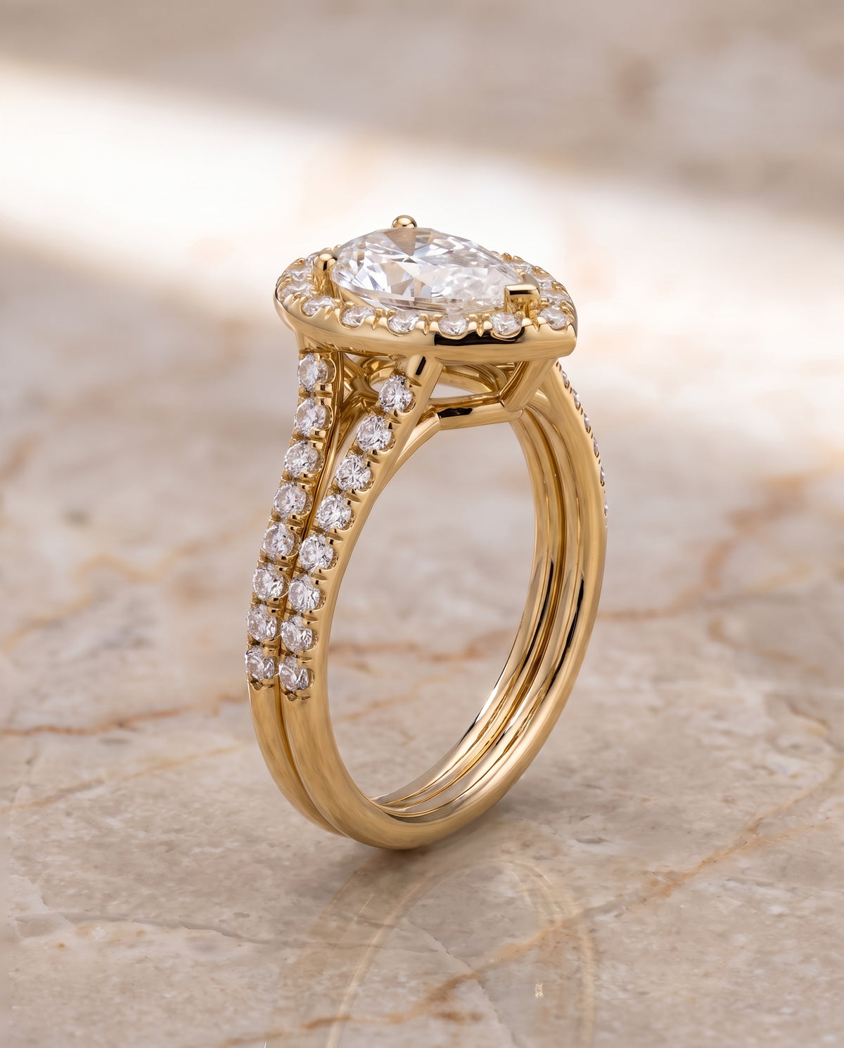 The Lira French Pavé Split Shank Halo Pear Engagement Ring Setting in 18K Yellow Gold