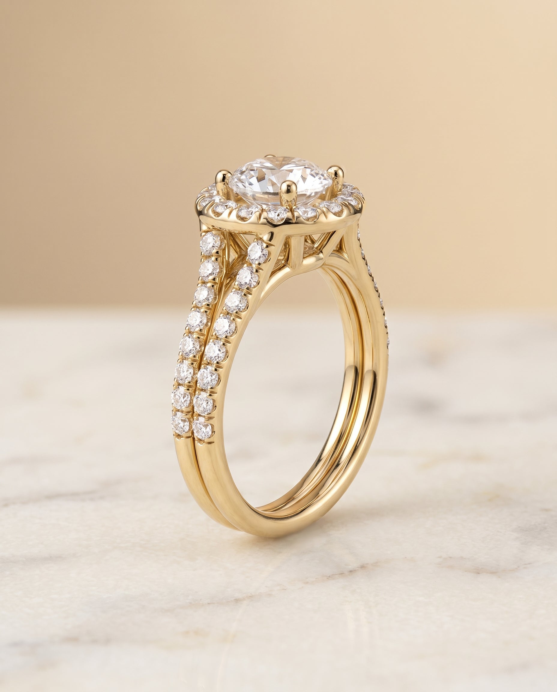 The Lira setting for round diamonds, made to order in 18K Yellow Gold | RockHer