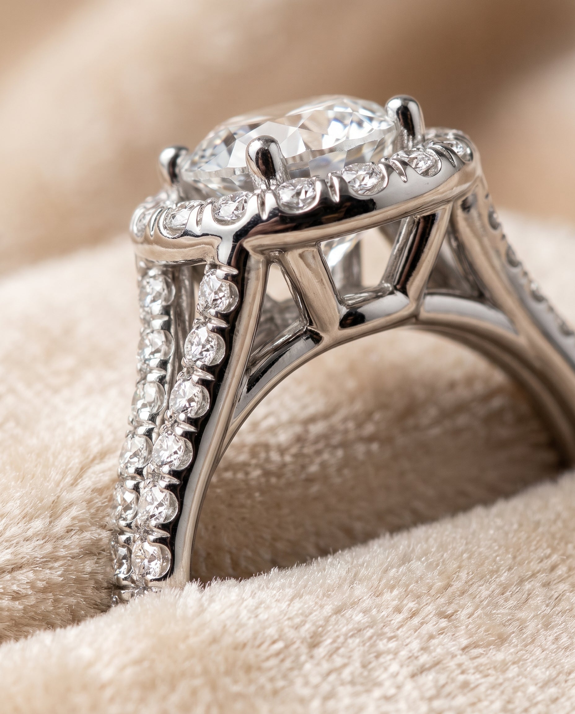 The Lira French Pavé Split Shank Halo Round Engagement Ring Setting in 18K White Gold