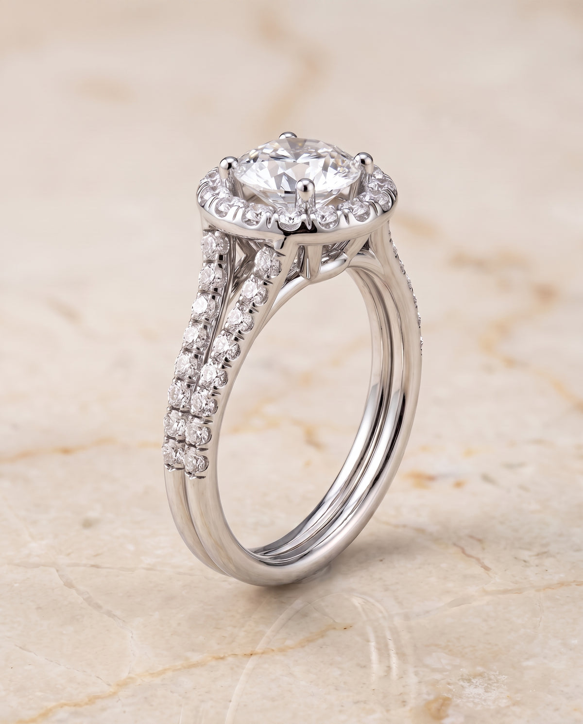 The Lira French Pavé Split Shank Halo Round Engagement Ring Setting in 18K White Gold