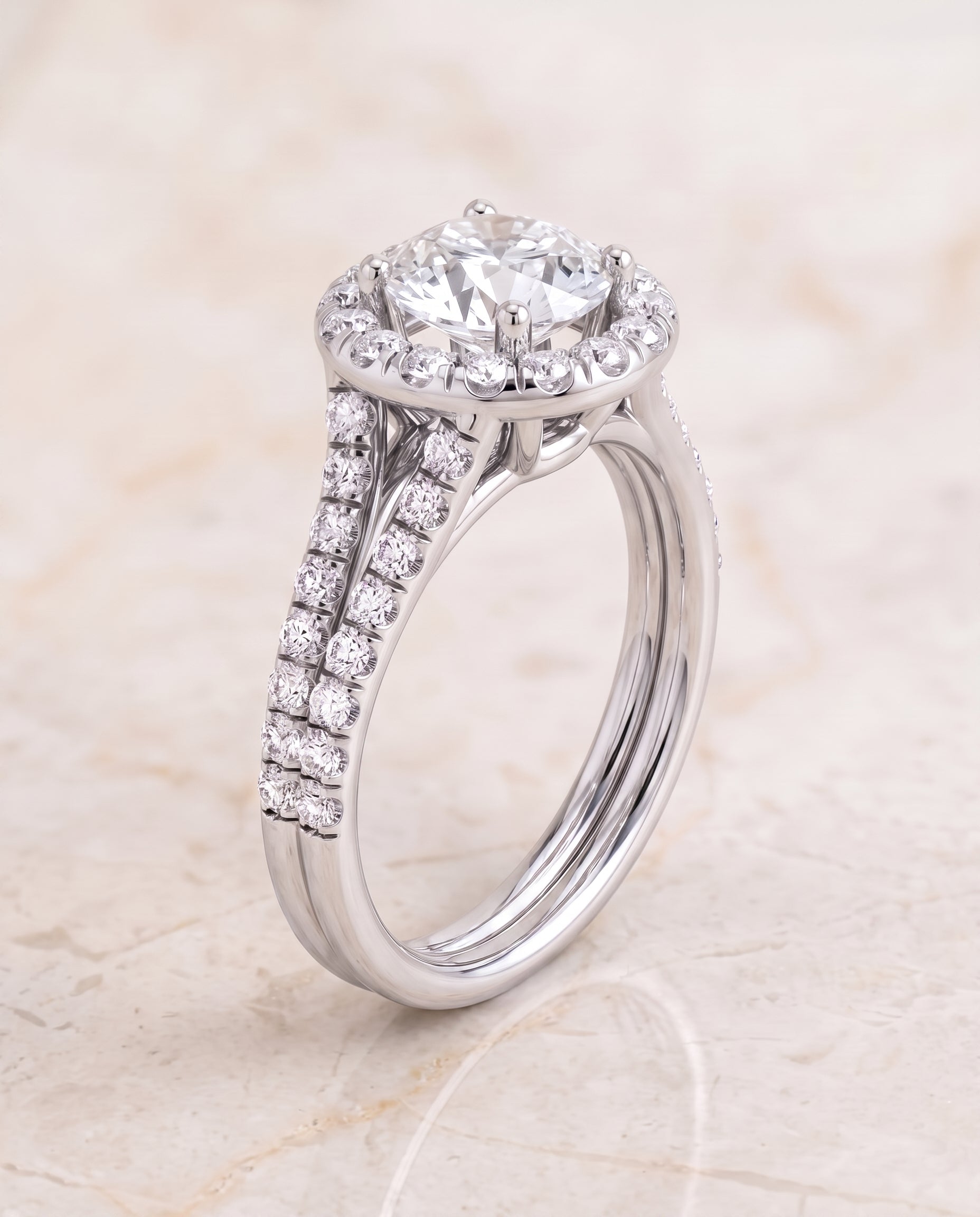 The Lira French Pavé Split Shank Halo Round Engagement Ring Setting in 18K White Gold