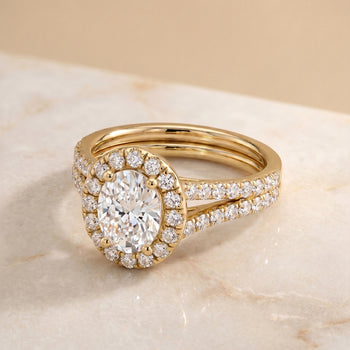 The Lira French Pavé Split Shank Halo Oval Engagement Ring Setting in 18K Yellow Gold