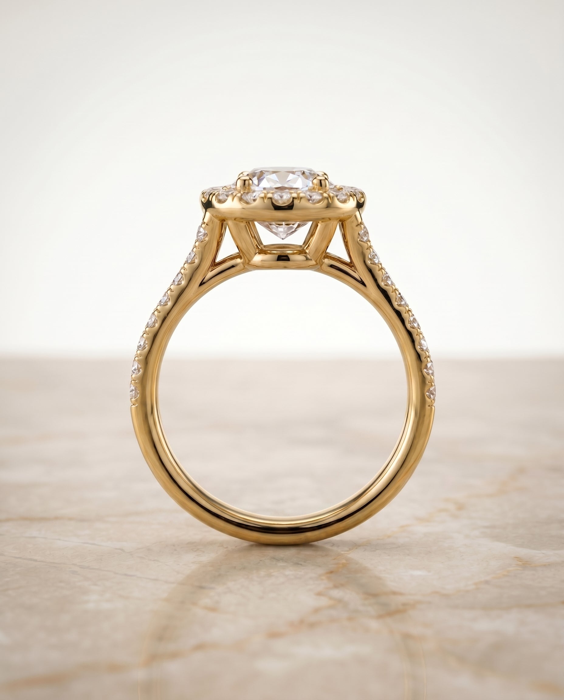 The Lira setting for oval diamonds, made to order in 18K Yellow Gold | RockHer
