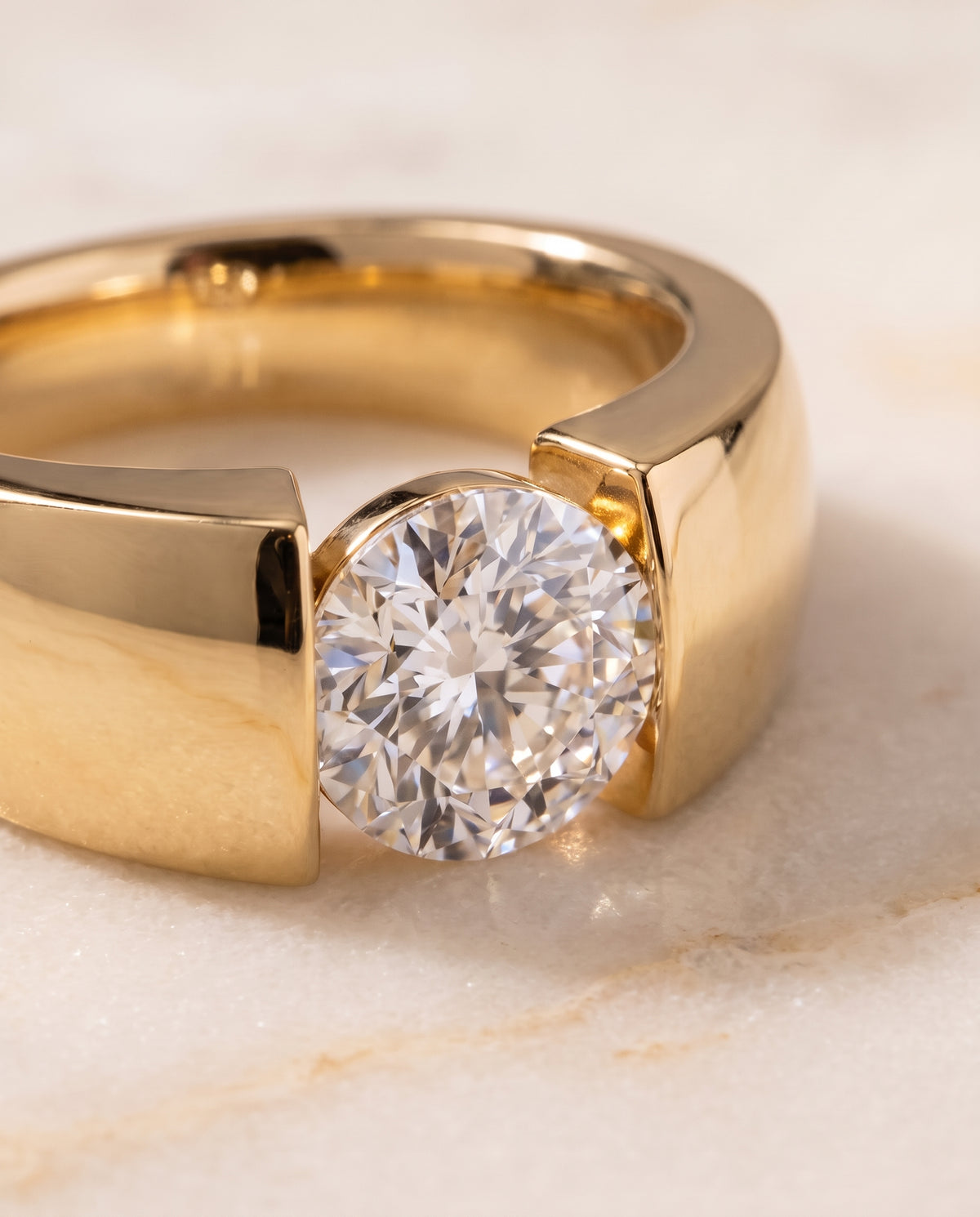 The Lola Cigar Band Solitaire Round Engagement Ring Setting in 18K Yellow Gold