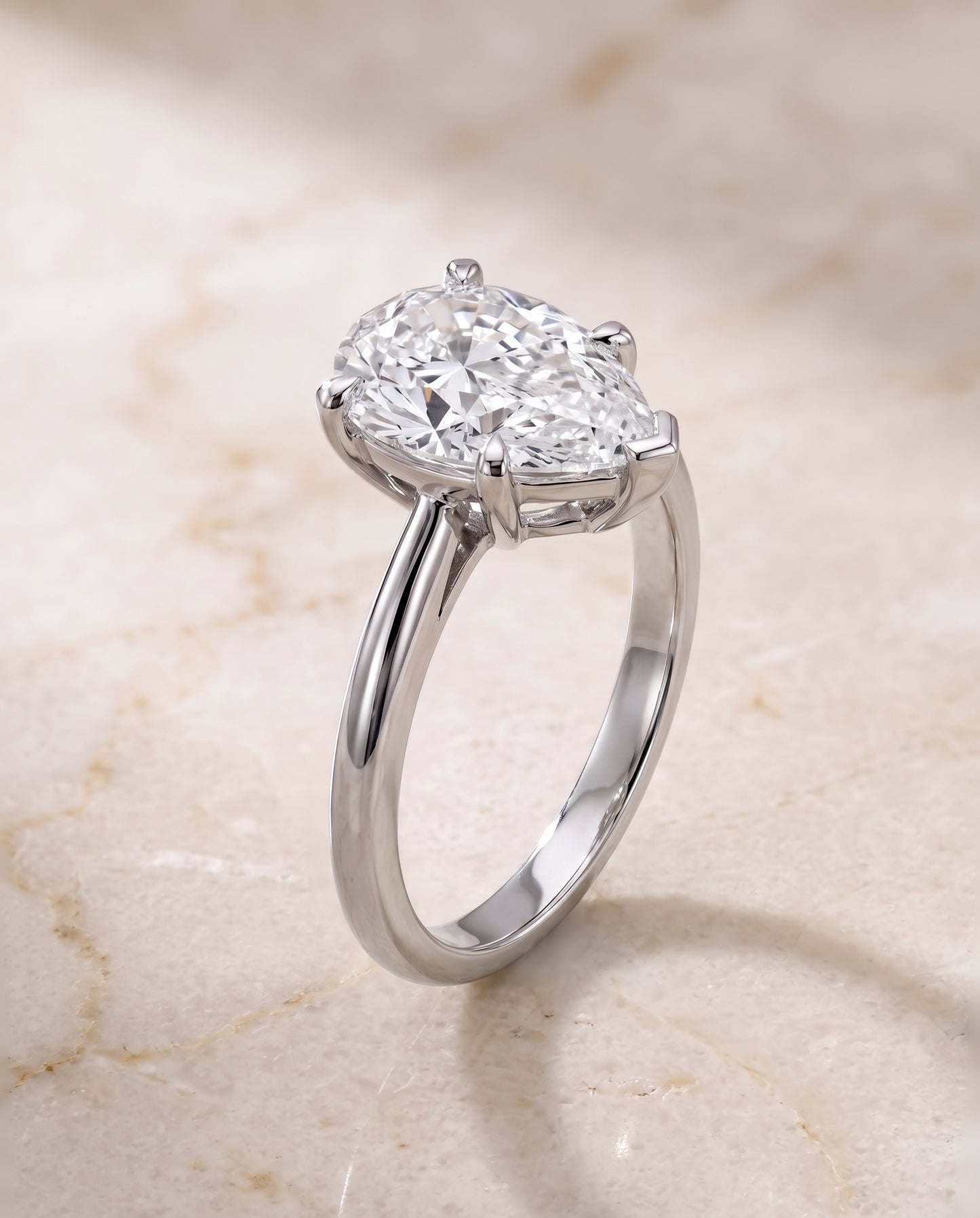 The Lolette Classic Low Base Solitaire Pear Engagement Ring Setting in Platinum