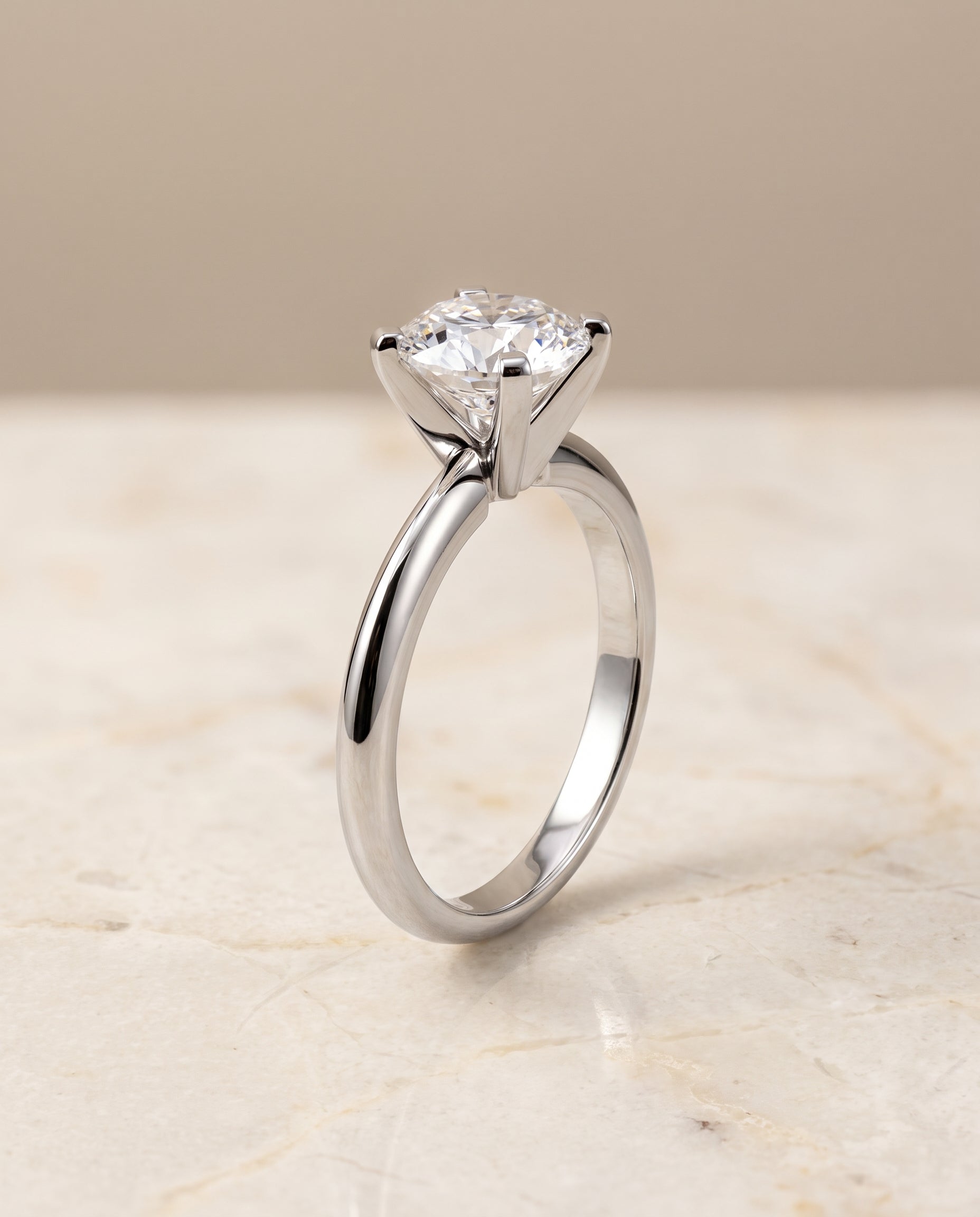 The Lolette Classic Low Base Solitaire Round Engagement Ring Setting in Platinum
