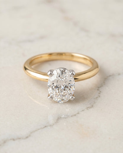 Lolette Select Solitaire Oval Lab Diamond Engagement Ring in 18K Yellow Gold, shown on hand, angled | RockHer