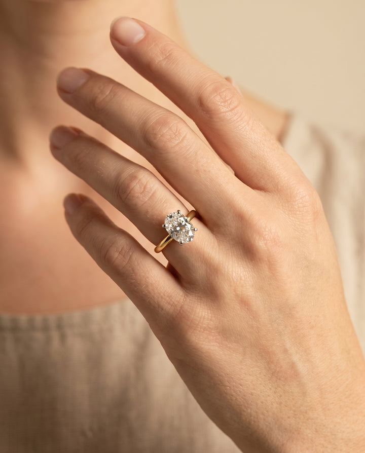 The Lolette Solitaire Engagement Ring Setting for Oval Diamonds in 18K Yellow Gold