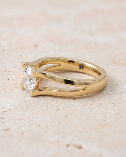The Lorelei Plain High Polish Split Shank Solitaire Round Engagement Ring Setting in 18K Yellow Gold