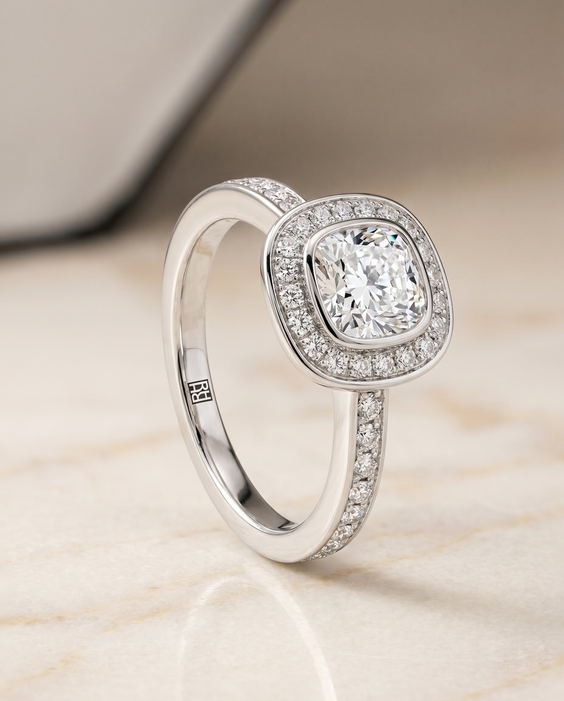 Bezel Halo Channel Band Cut styling on The Marcia cushion engagement ring setting | RockHer
