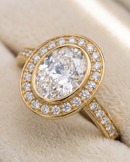 Oval engagement ring setting in 18K Yellow Gold, Marcia Bezel Halo Channel Band Oval, alternate view | RockHer
