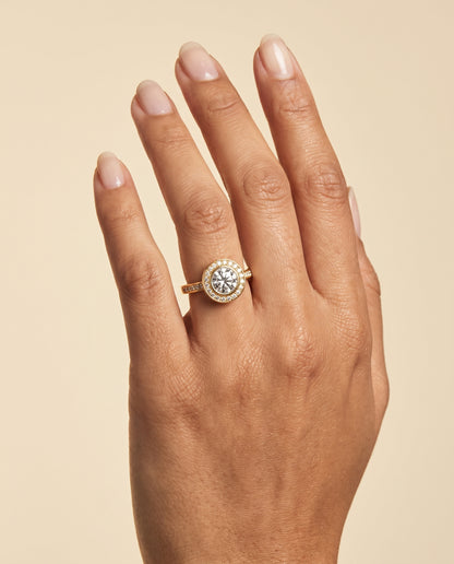 The Marcia Bezel Halo Channel Band Round Engagement Ring Setting in 18K Yellow Gold