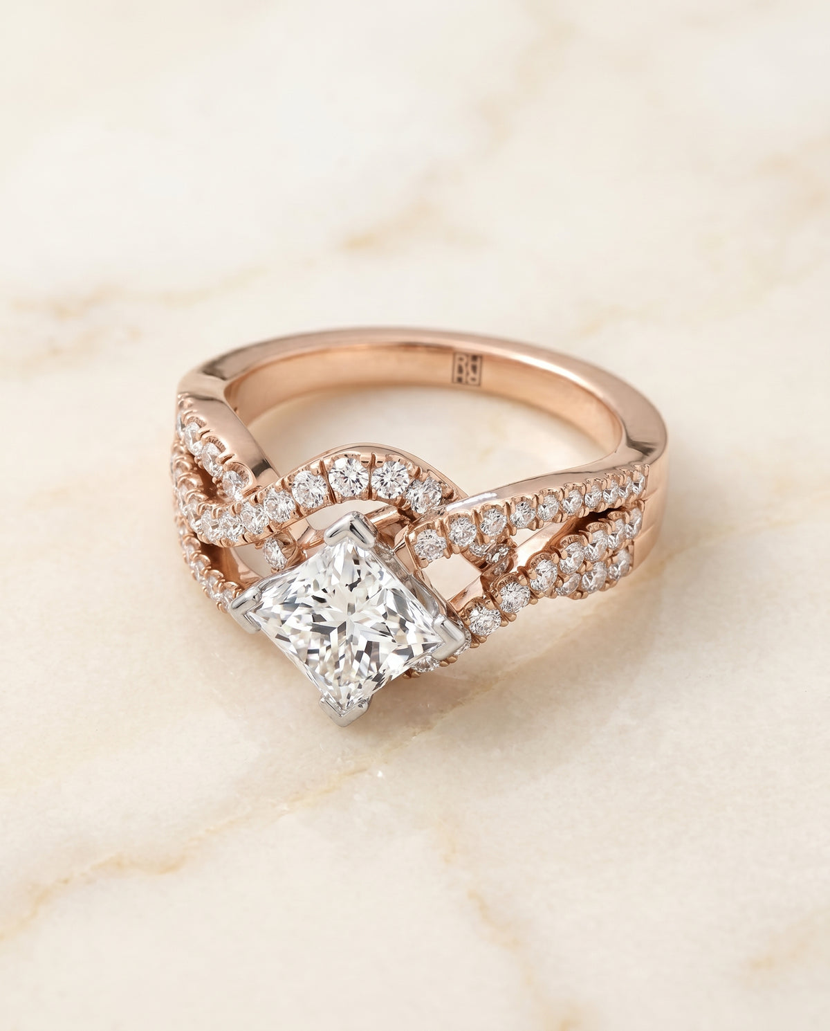 The Marguerite Twisted Engagement Ring Setting for Princess Diamonds in 14K Rose Gold | RockHer